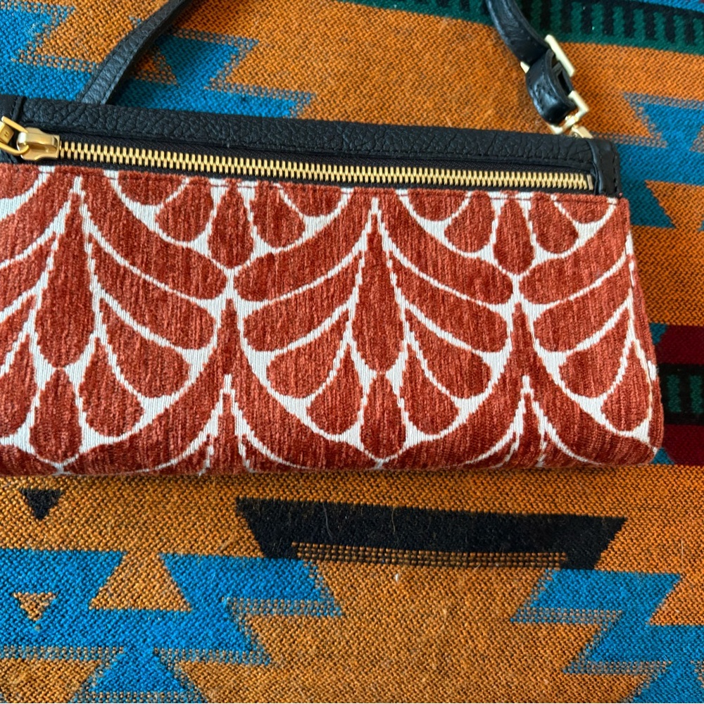 This is a Hammitt AJ Crossbody Clutch in the Texas Tapestry pattern.